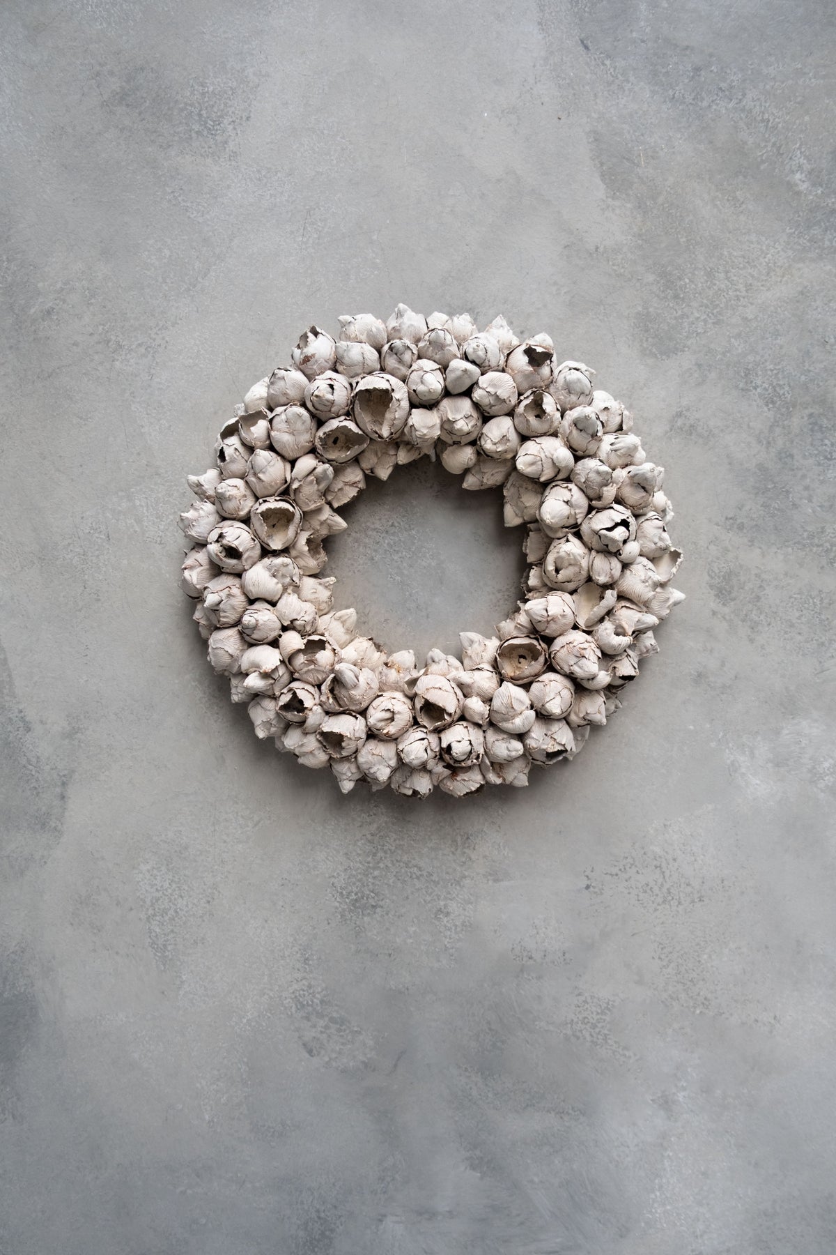 Kokosfruchtkranz · Ø 30–65 cm · Sandstein · 30 cm · Ansicht 1