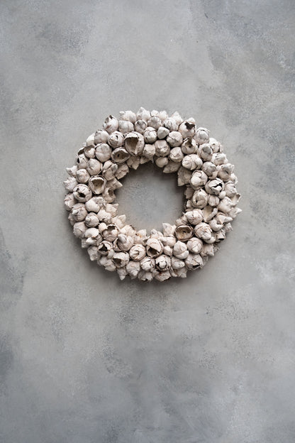 Kokosfruchtkranz · Ø 30–65 cm · Sandstein · 30 cm · Ansicht 1