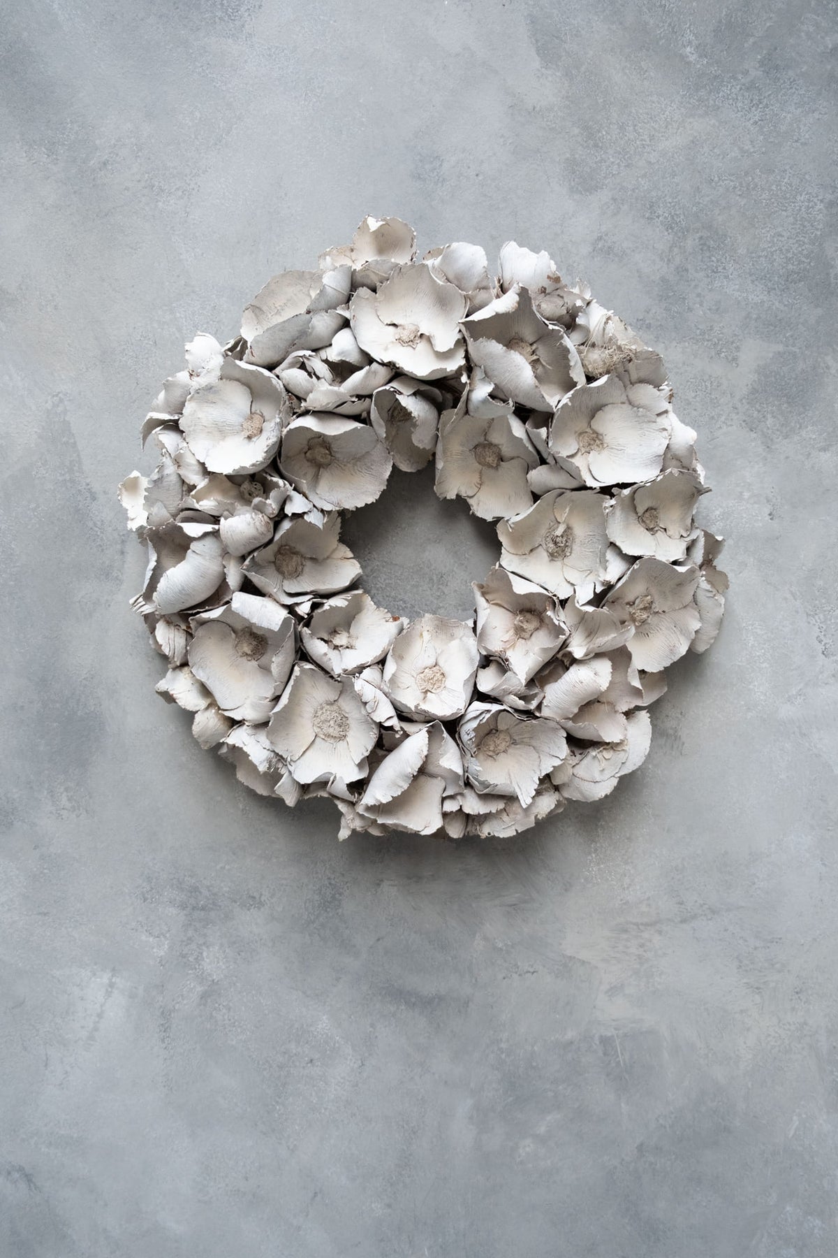 Palm cup wreath · Sandstone