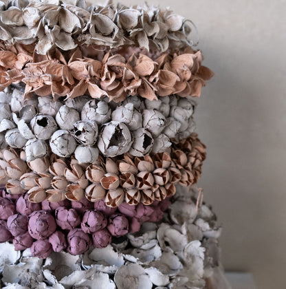 Palm cup wreath · Sandstone