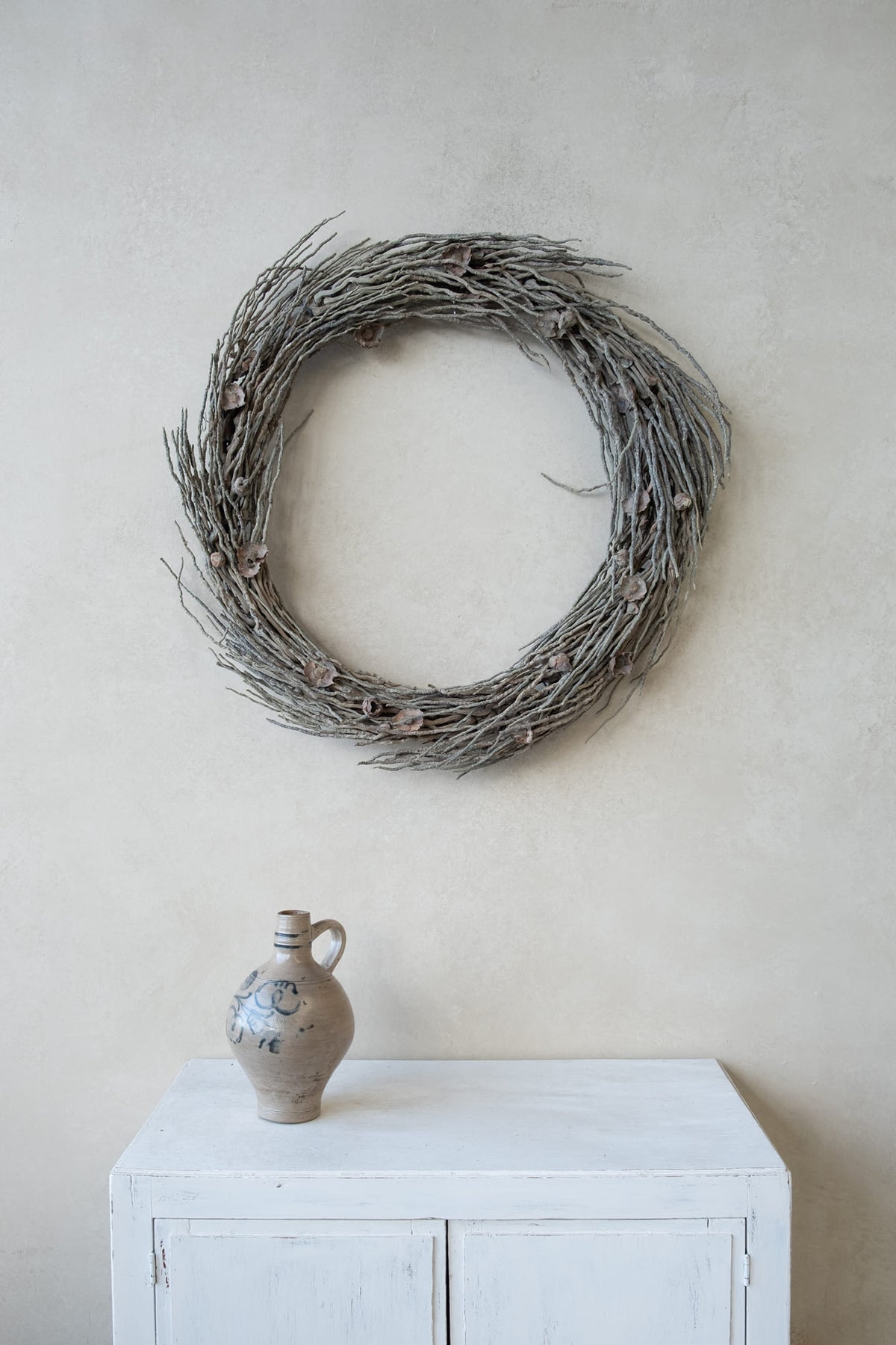 Coco branch wreath · Pebble green